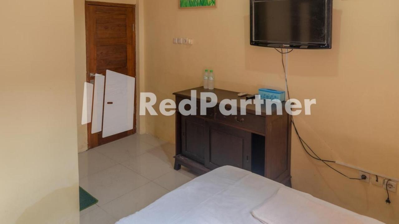 Vandhela Homestay Syariah Mitra Reddoorz Surabaya Exterior photo
